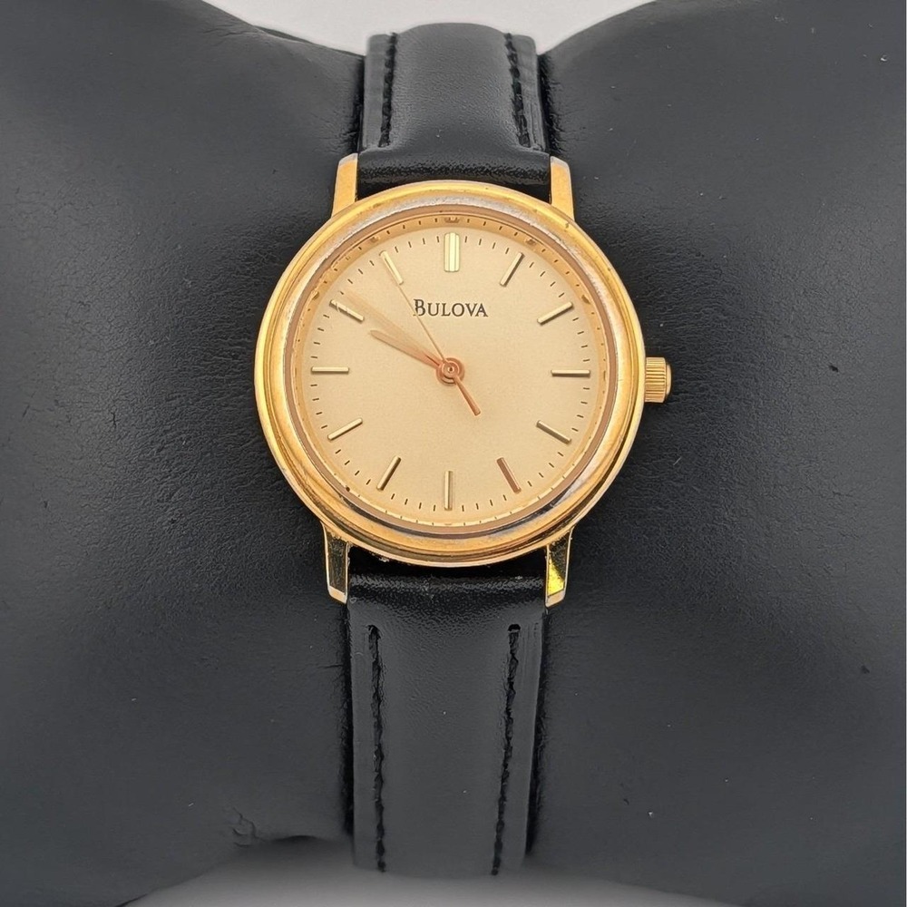 Bulova Gold Tone Dress Watch Champagne Dial Black Leather Strap Quartz Vintage